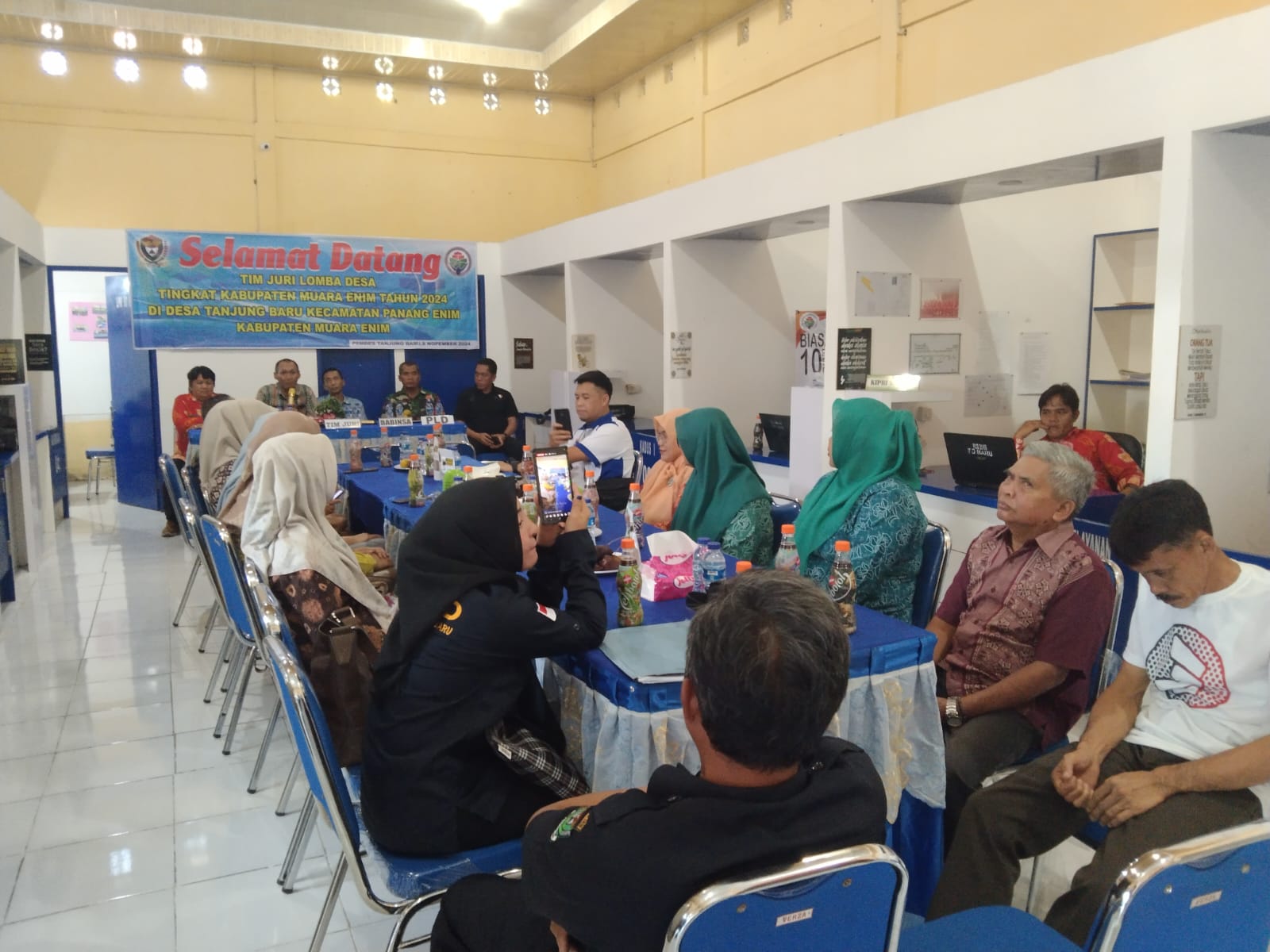 Babinsa Tanjung Baru Hadiri Penilaian Lomba Desa Tingkat Kabupaten