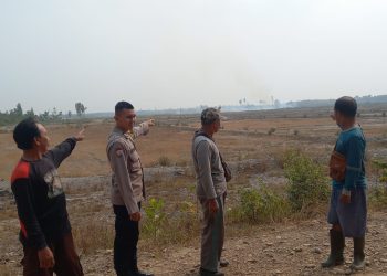 Polsek Lembak Verifikasi Hotspot BRIN di Lahan Cetak Sawah Desa Petanang
