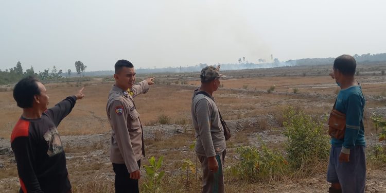 Polsek Lembak Verifikasi Hotspot BRIN di Lahan Cetak Sawah Desa Petanang